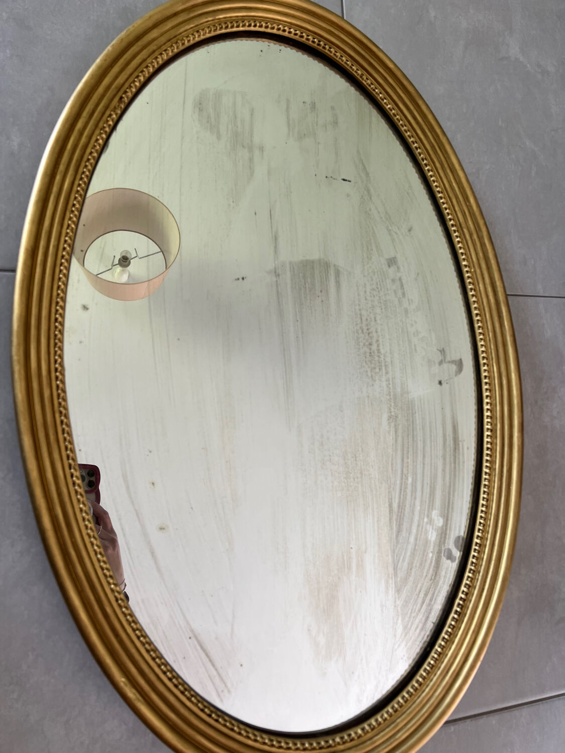Vintage oval gold mirror