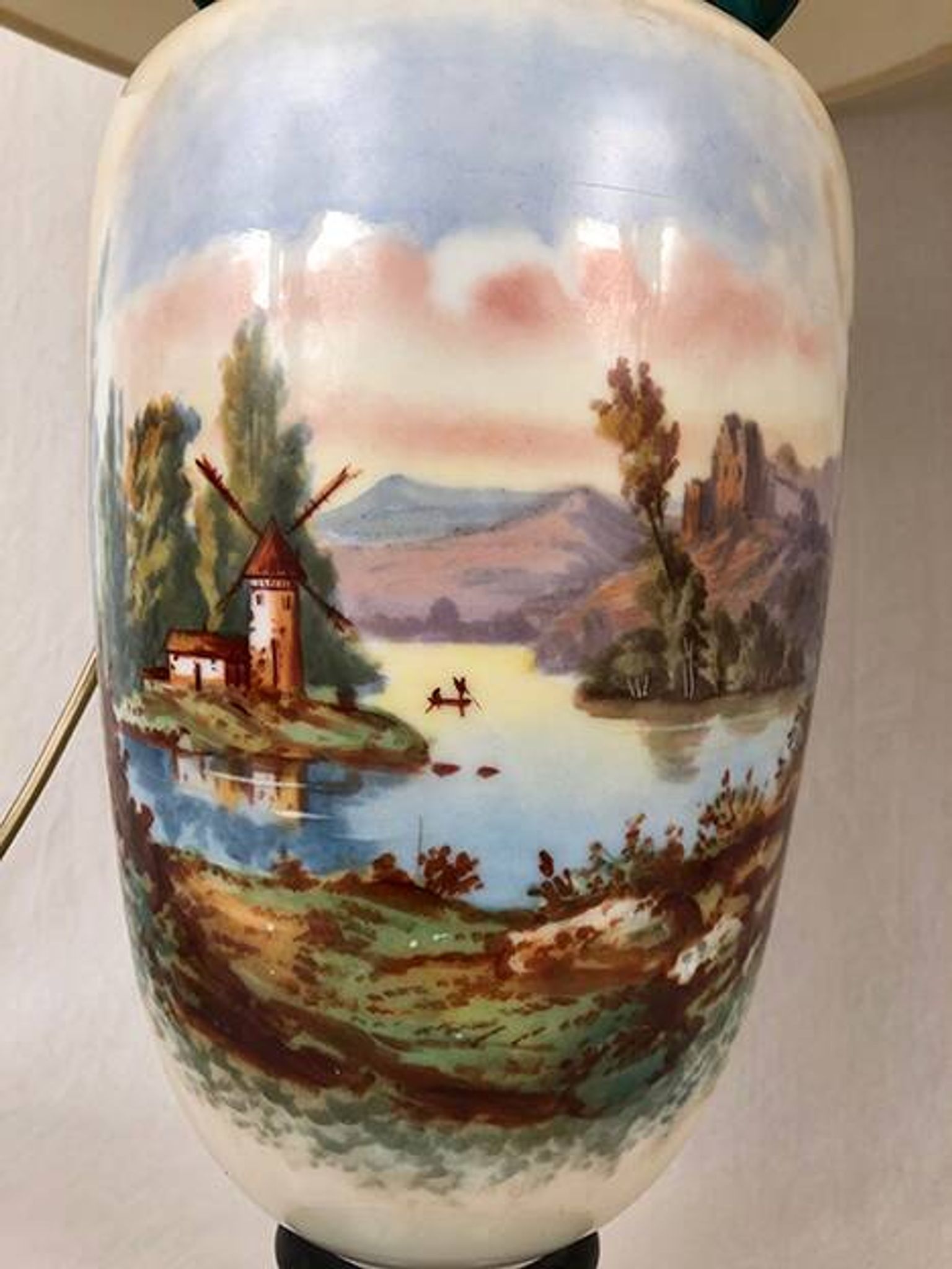 Large pair of 19th century polychrome porcelain vases decorated with landscapes, mounted as lamps