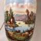 Large pair of 19th century polychrome porcelain vases decorated with landscapes, mounted as lamps