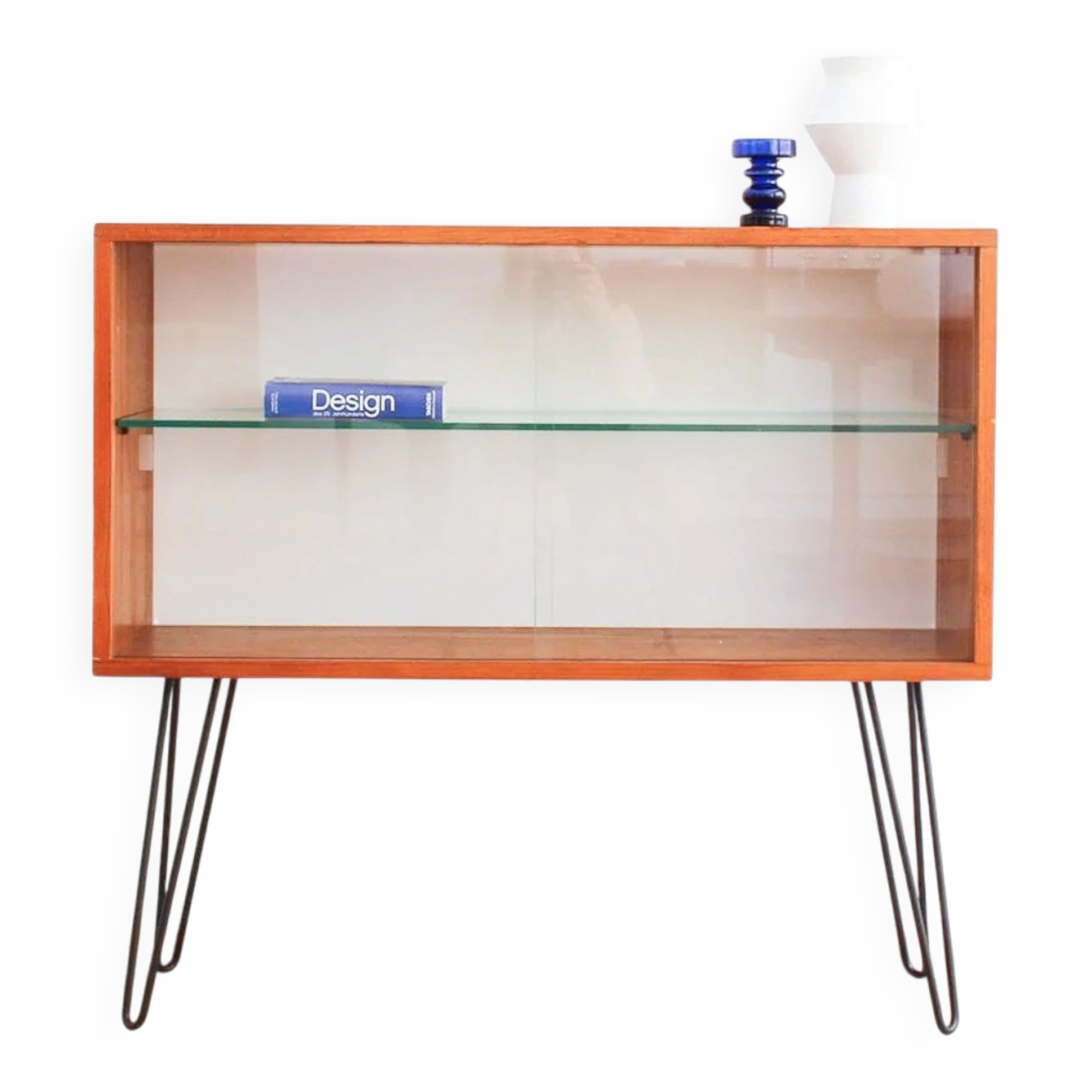 Teak display cabinet with black hairpin legs.