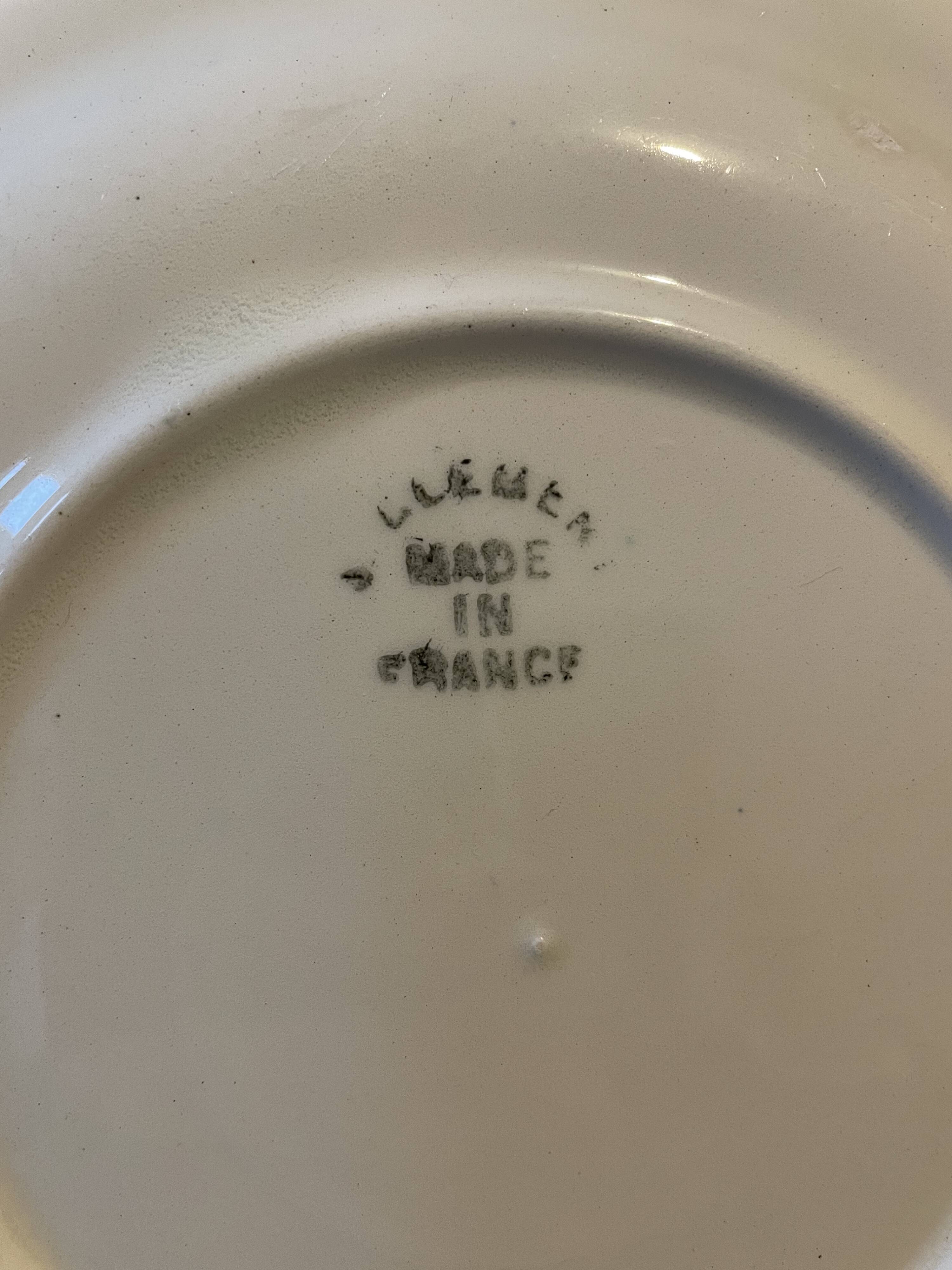 Set of 11 Saint Clément earthenware dessert plates France