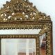Miroir à parecloses en laiton repoussé et bois Napoléon III 43x70cm