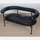 Two-seater leather banquette from the 1980s.