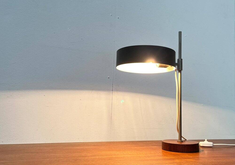 Mid-century minimalist table lamp with a teak veneer base, 1960s.