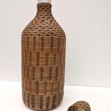 Vintage bottle in braided straw