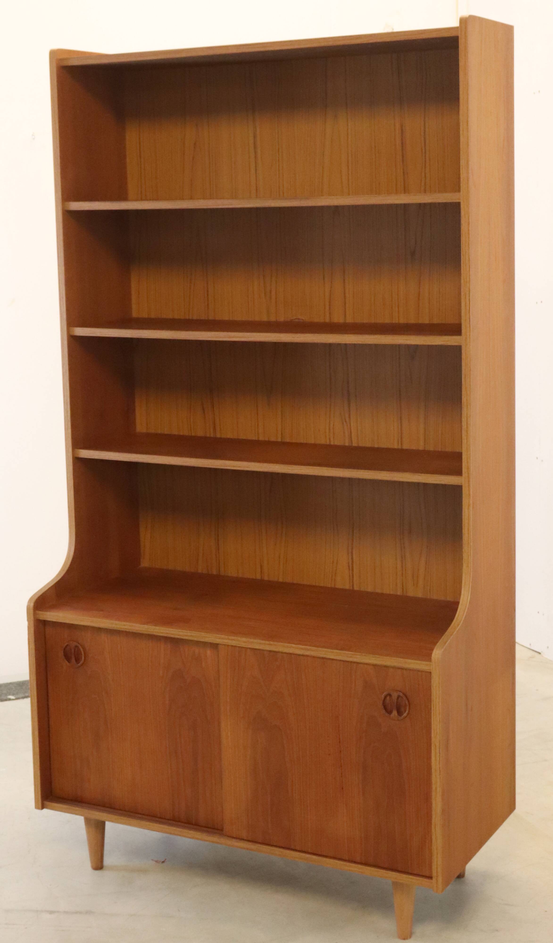 vintage bookcase with full on storage space.