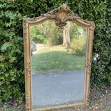 Old Louis XV style mirror in wood and gilded stucco. Napoleon III