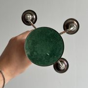Candlestick candle holder in patinated silver metal