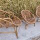 Set de trois fauteuils en rotin.