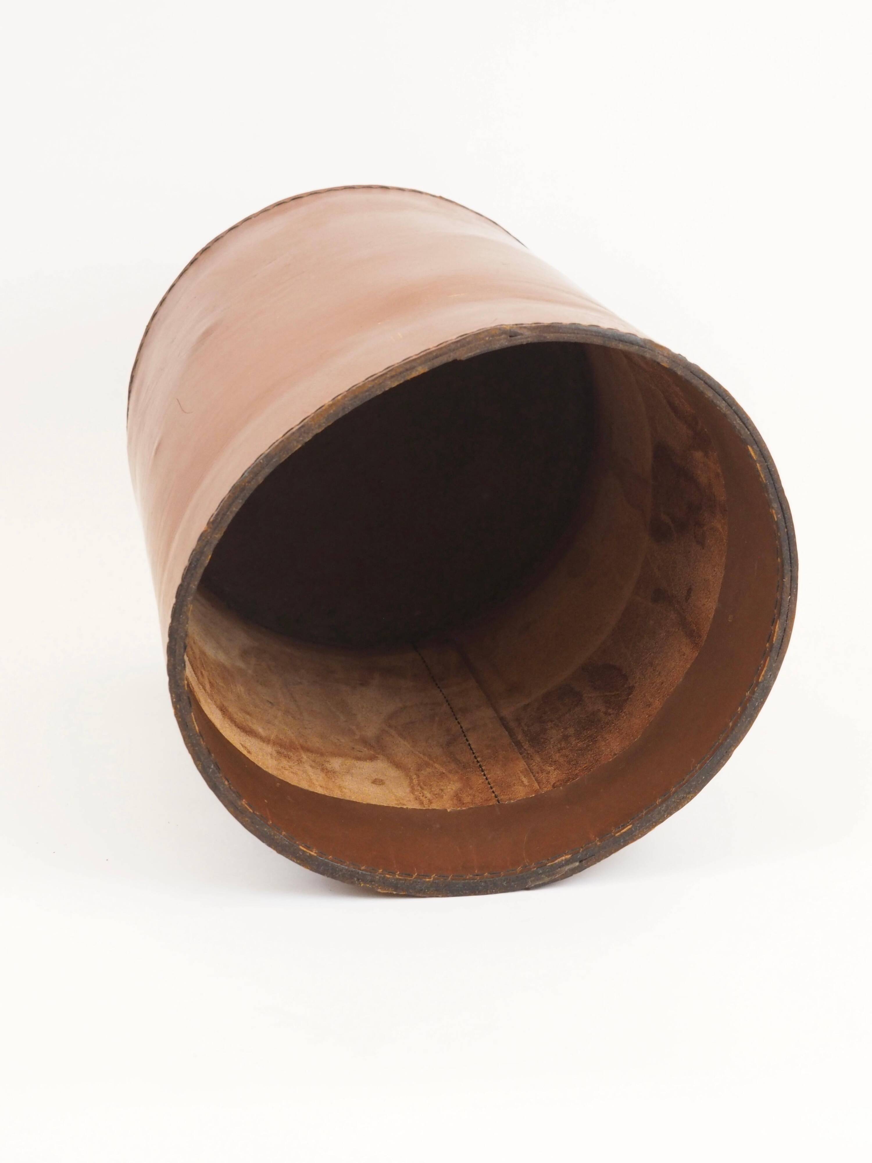 Authentic leather wastebasket/bin by Carl Auböck from the mid-20th century.