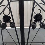 Pink-decorated iron umbrella door.