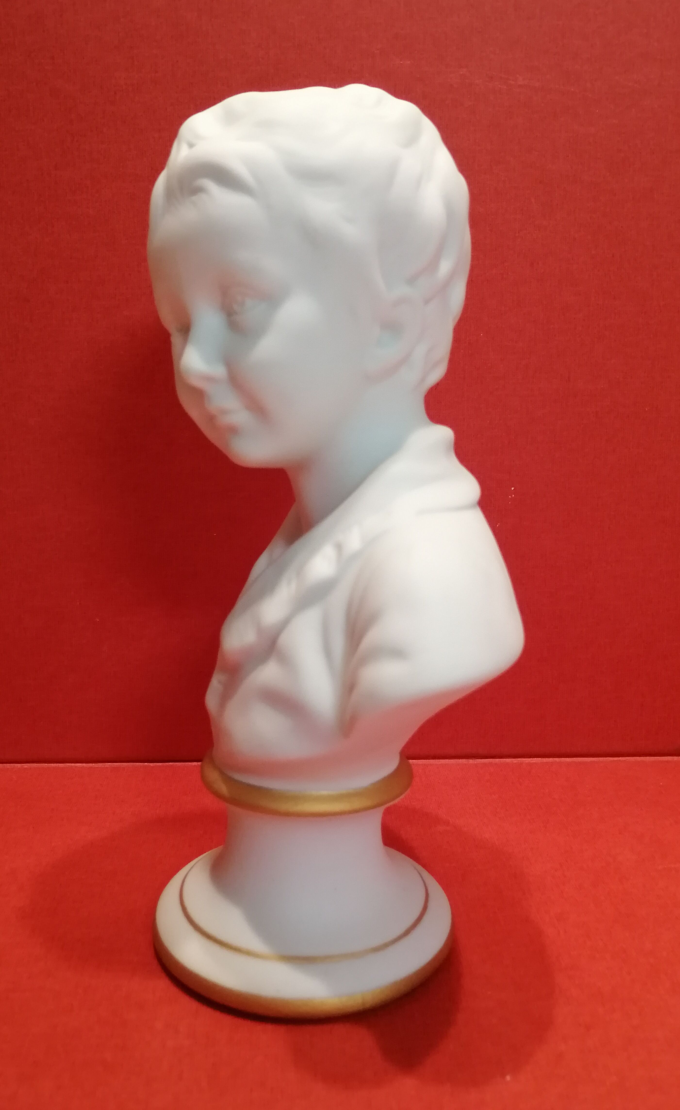 Small bust young boy in biscuit Tharaud Limoges