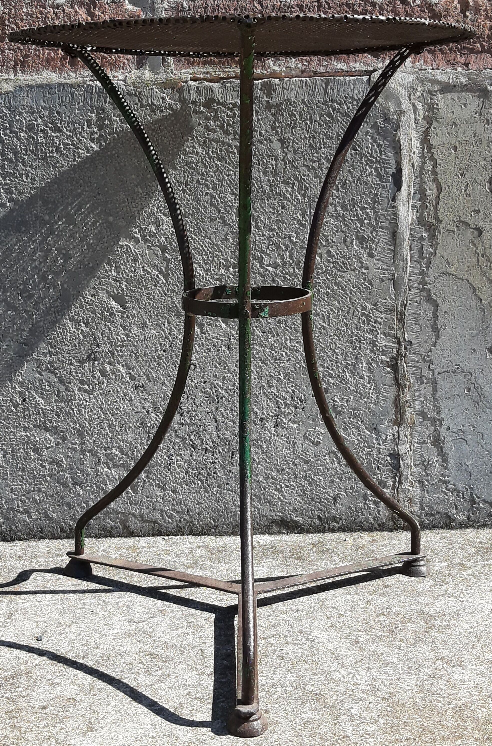 Wrought iron pedestal table