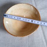 Old bowl in earthenware with floral decoration.