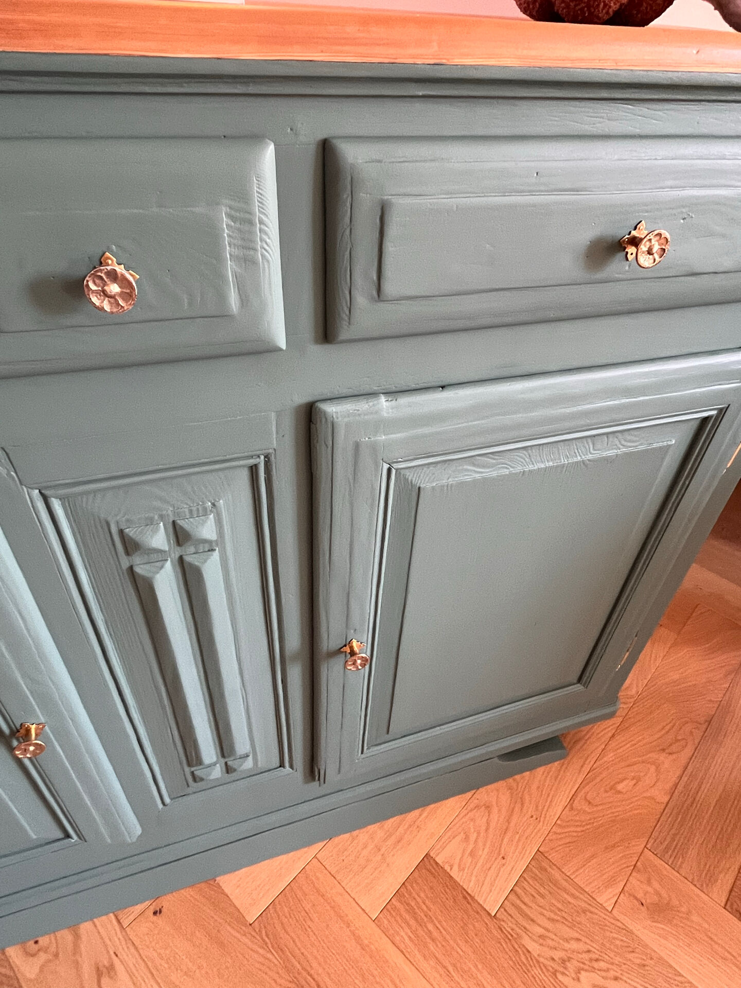 Sage green buffet with moustache legs