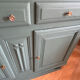 Sage green buffet with moustache legs