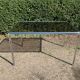 70s dining table in tubular chrome metal and smoked glass