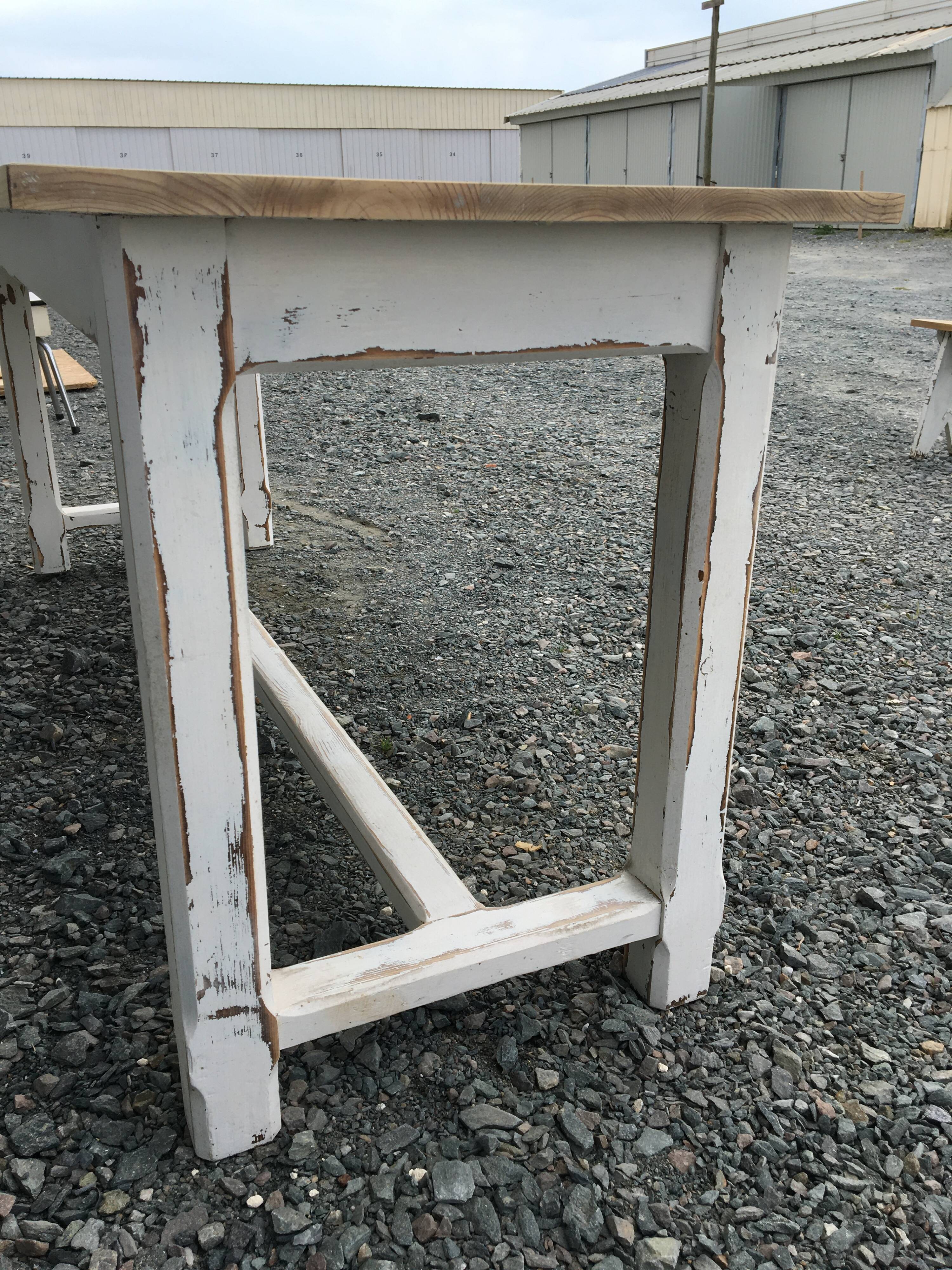 Farmhouse table with its two benches