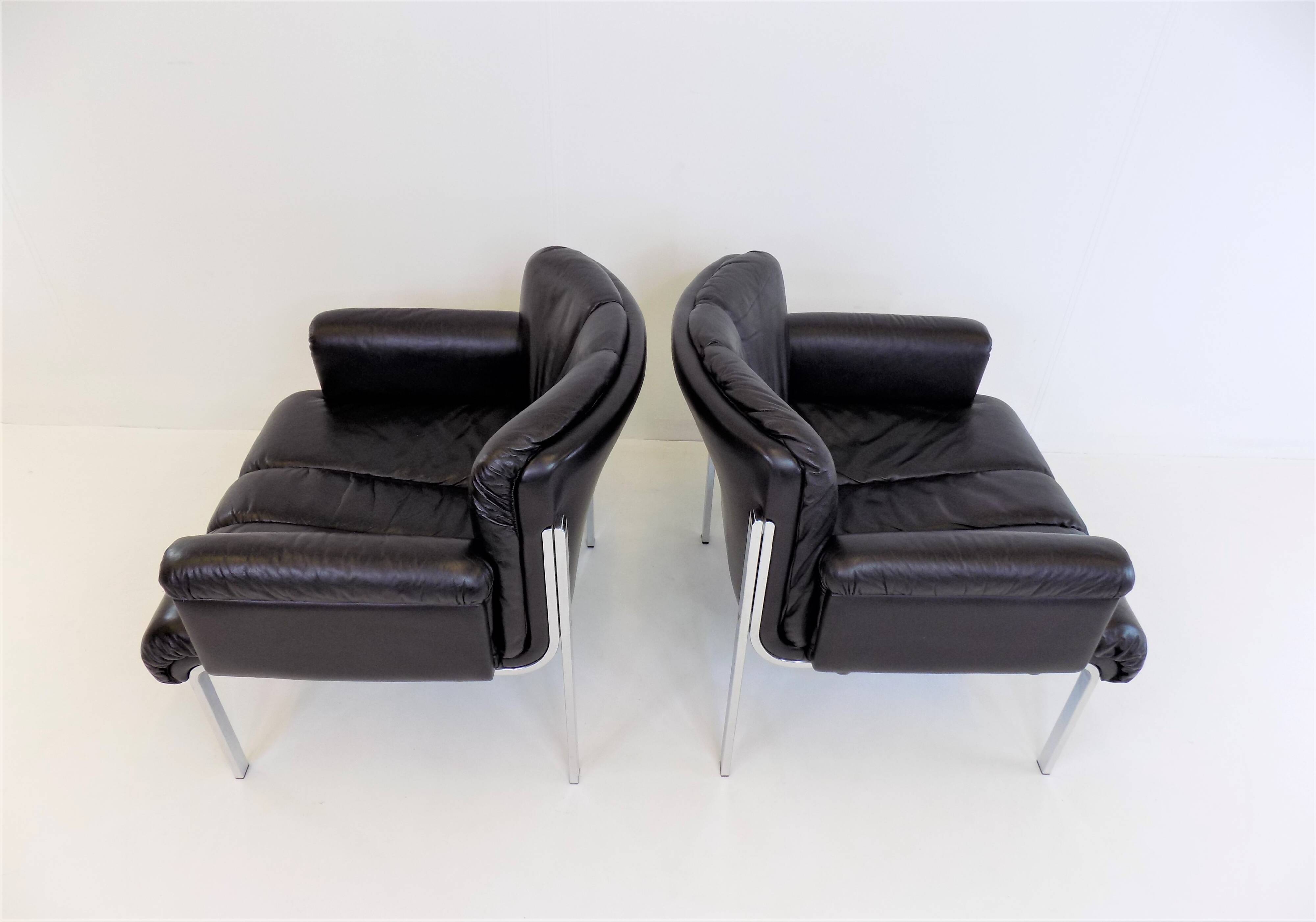 Set of 2 Girsberger Eurochair leather armchairs