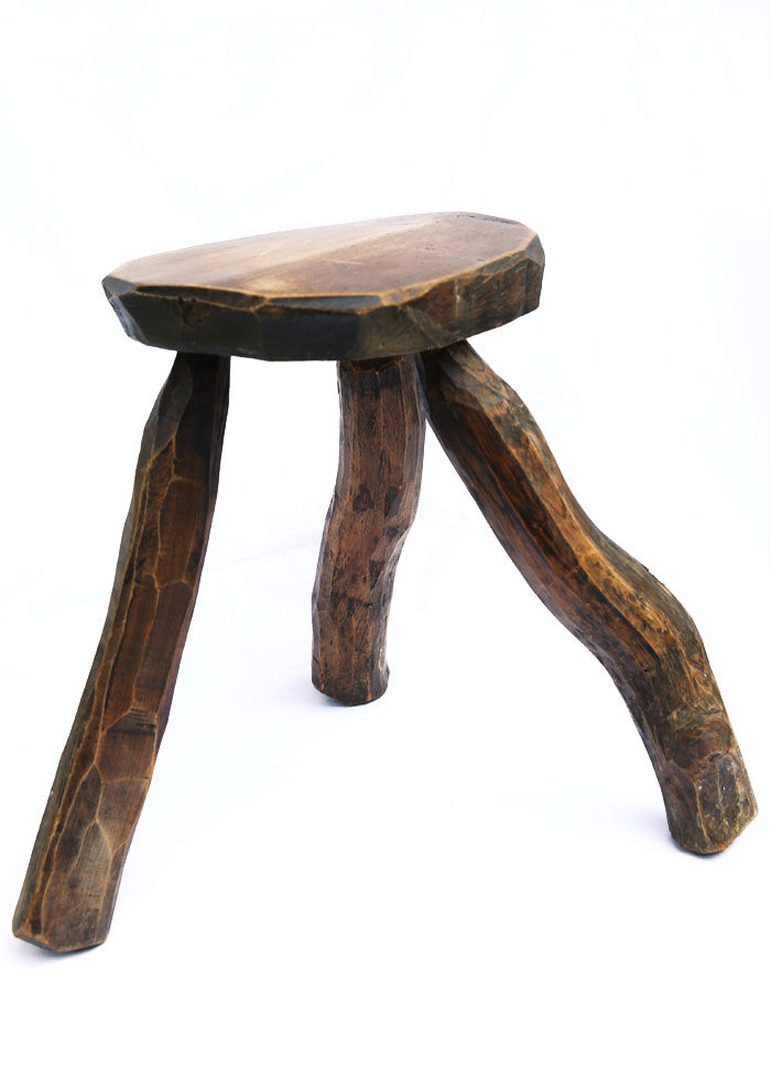 Brutalist folk art stool in solid wood