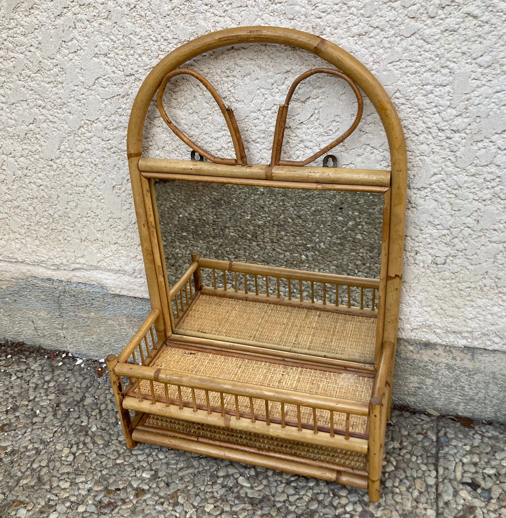 Vintage rattan wall shelf with mirror
