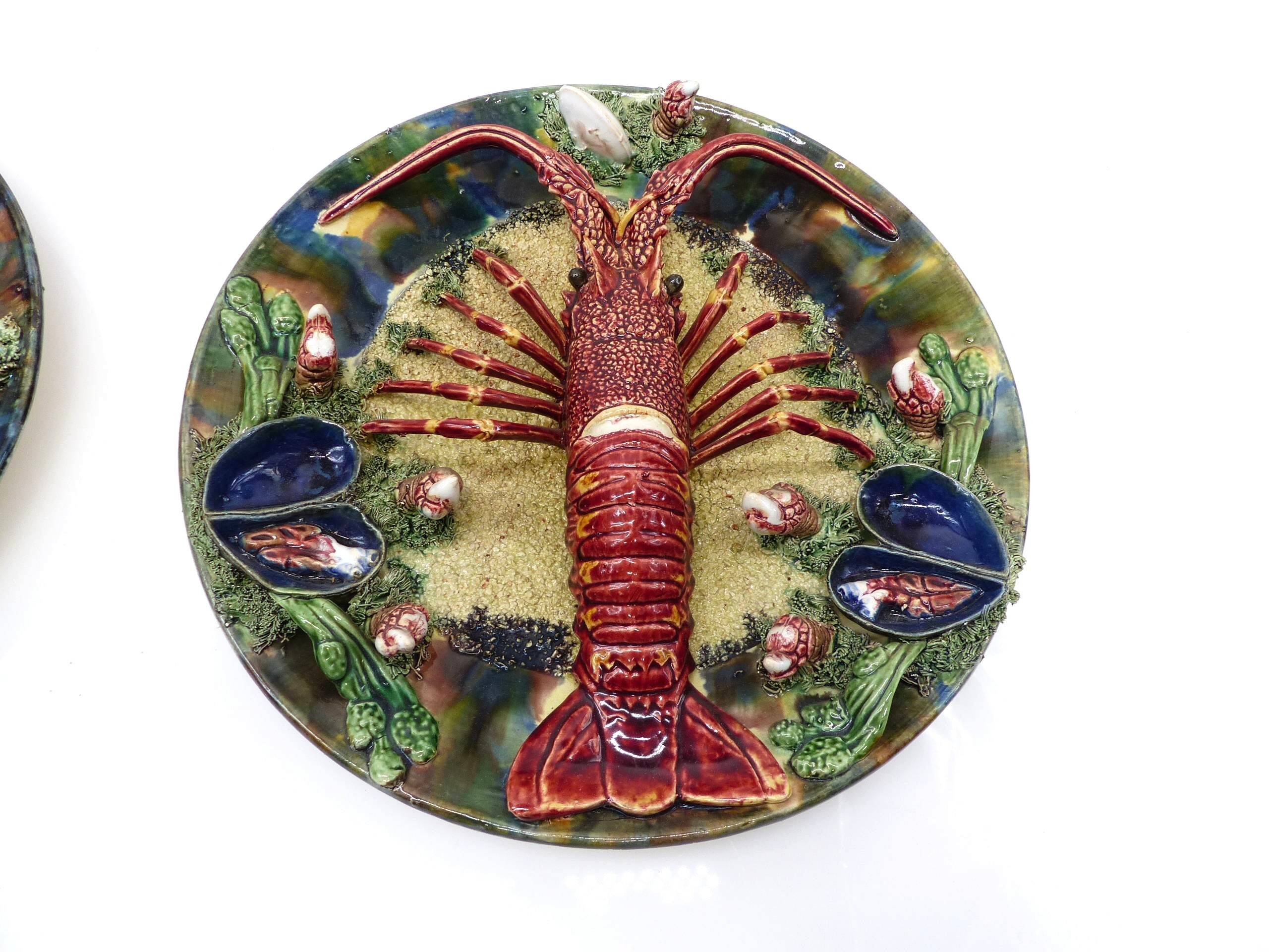 Pair of large wall plates Palissy Álvaro José Caldas da Rainha early 20th century