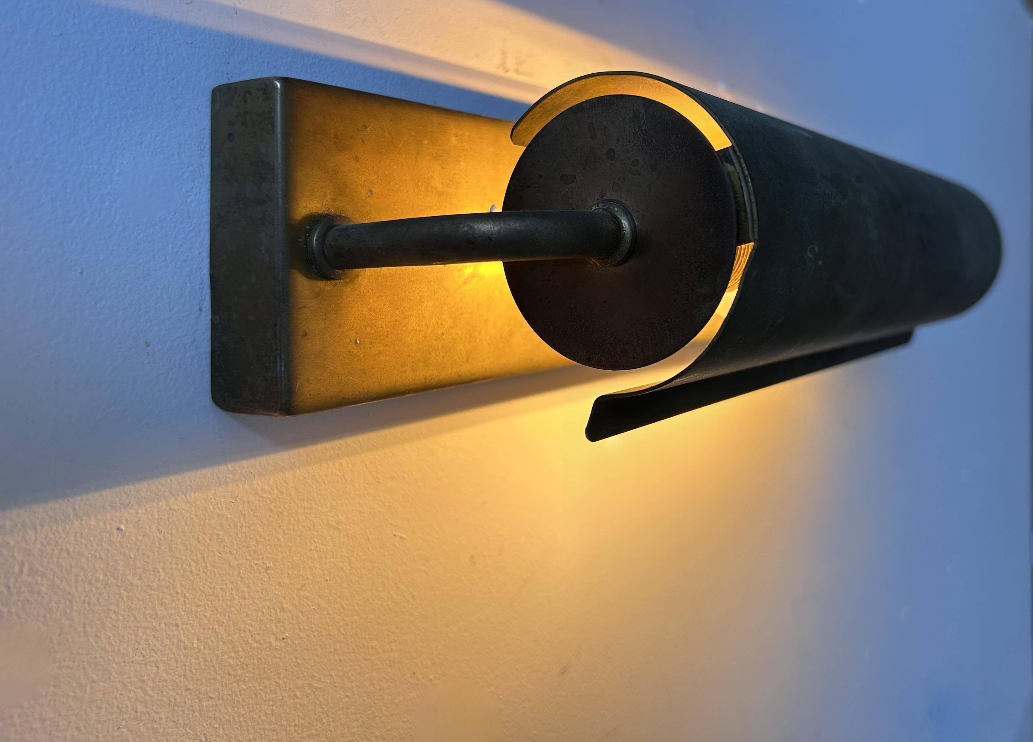 Modernist solid brass wall light, France 1940