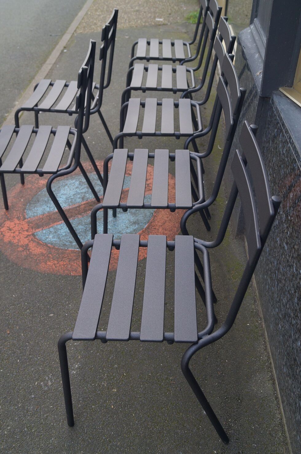 Suite of 8 steel bistro chairs