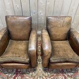 Paire de fauteuils Club en cuir usés