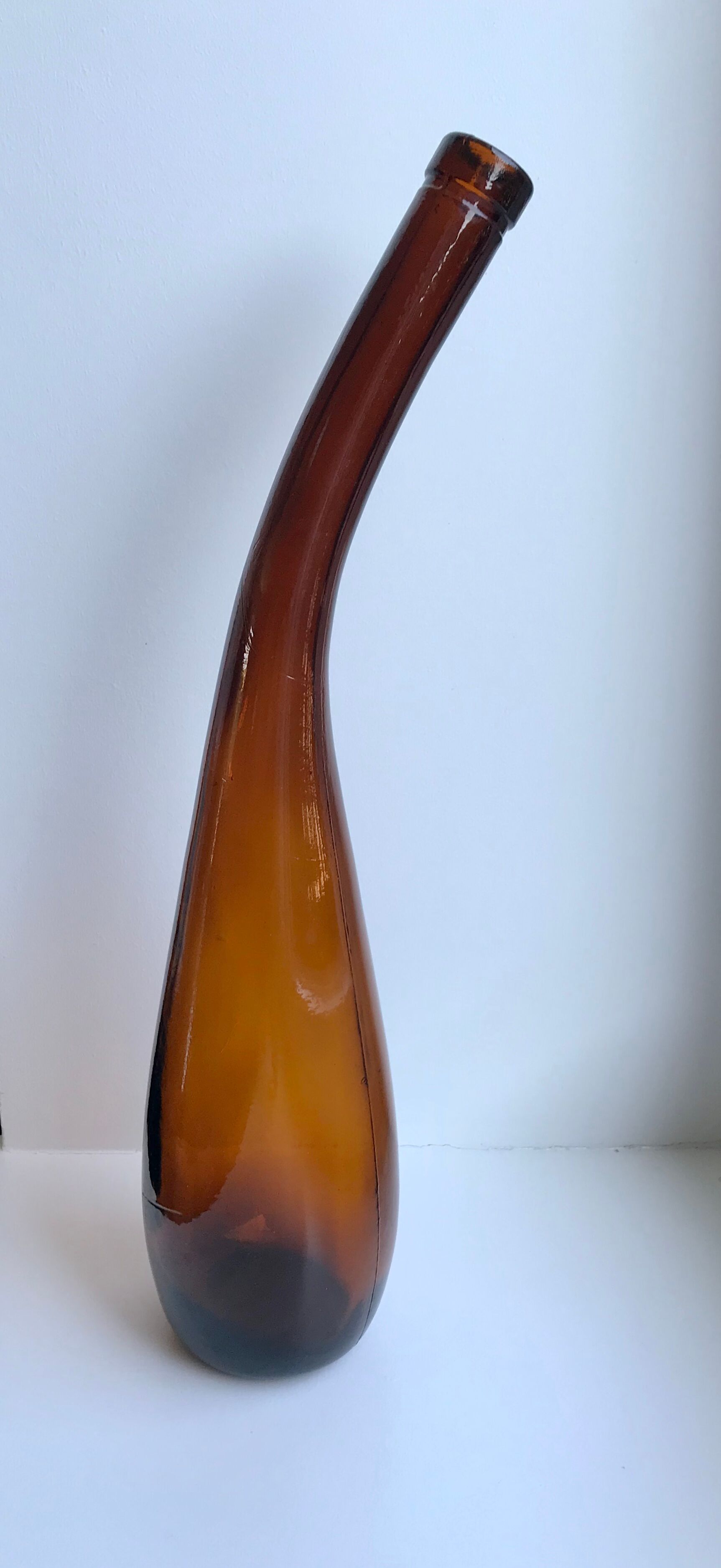 Amber bottle in blown glass 70s
