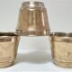 Three pot covers brass silver cover golden patina monogram early twentieth century