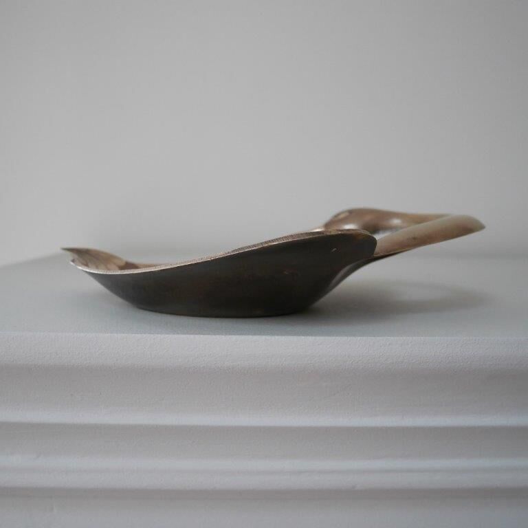 Brass swan pocket empty