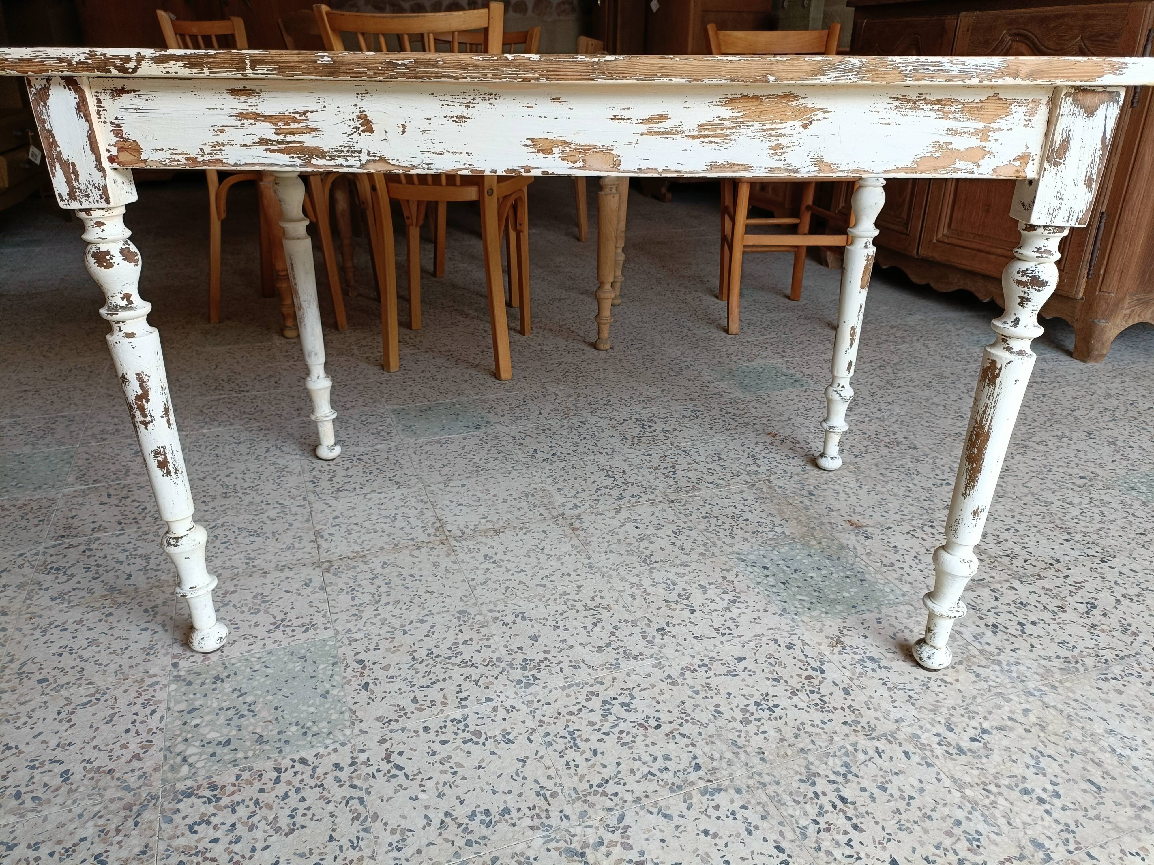 Patinated wooden table, restored.