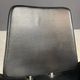 Alipes black swivel salon chair with chrome star base by Giorgetto Giugiaro