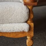 Henning Kjærnulf, lounge chairs in oak and lambswool, mid-century Danish, 1960s.