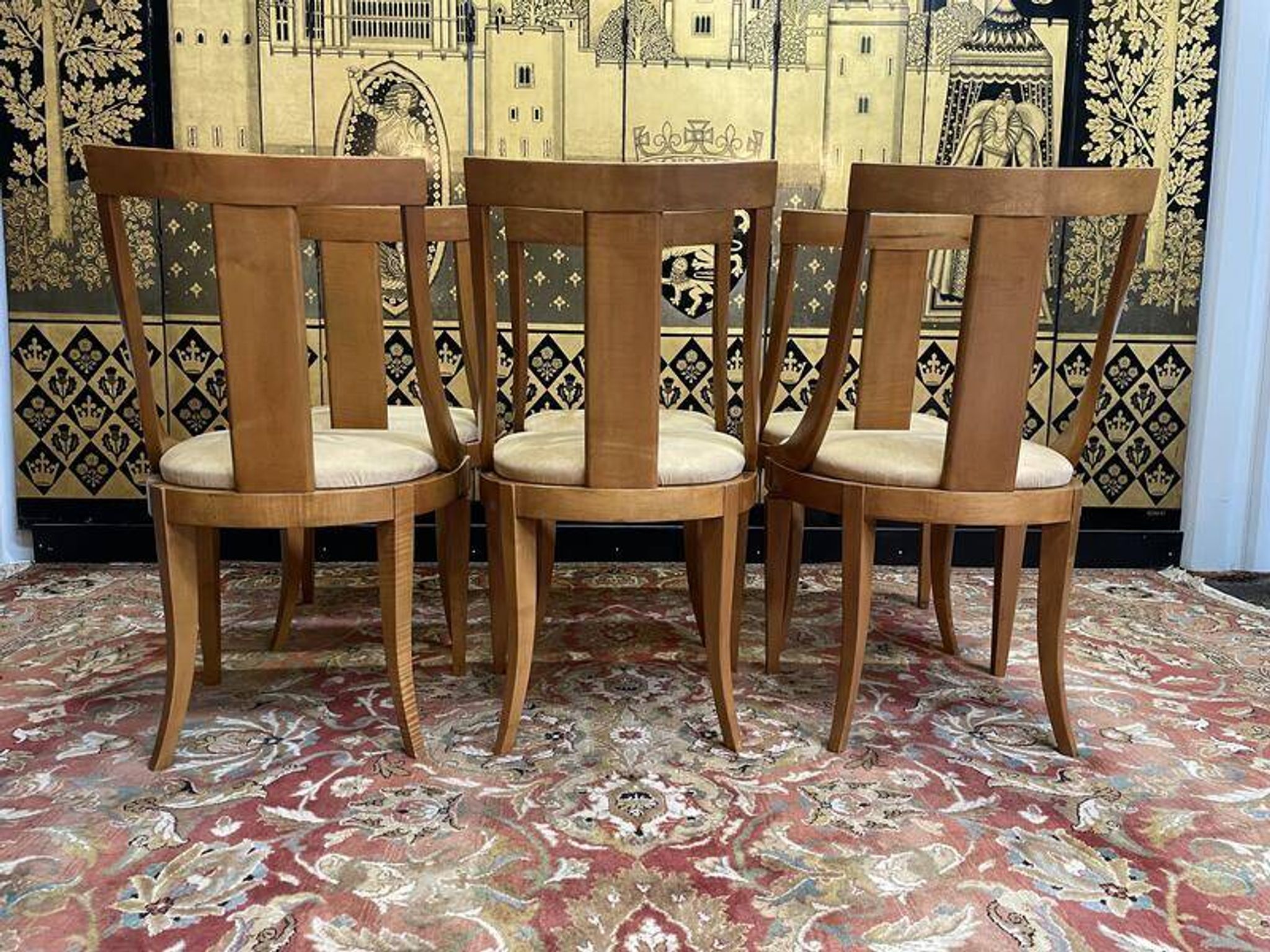 Suite de 6 chaises gondoles de style Empire