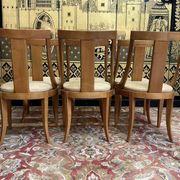 Suite de 6 chaises gondoles de style Empire