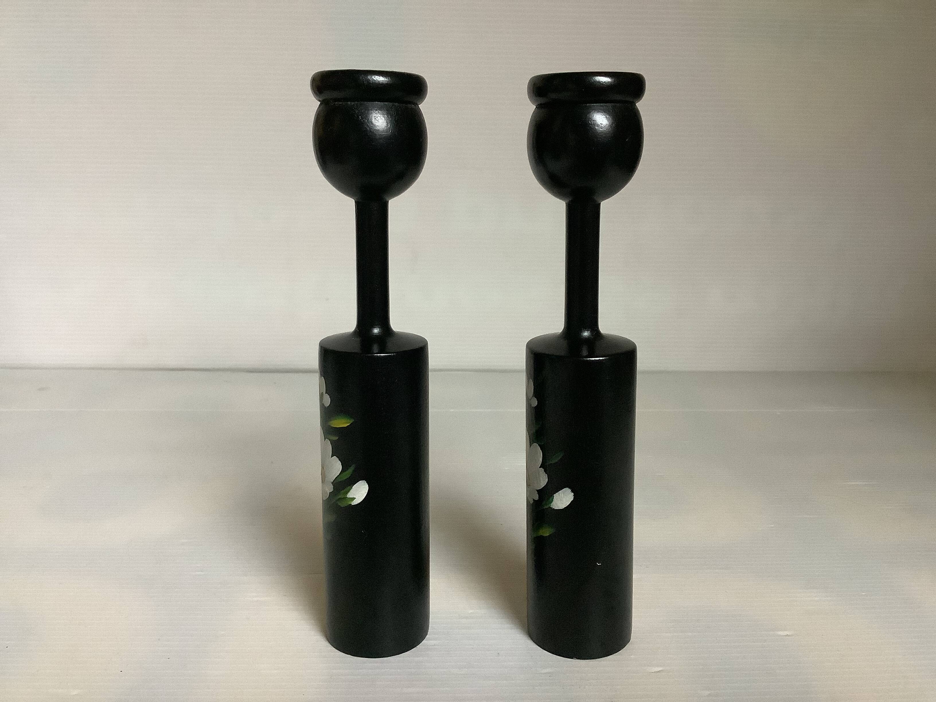 Pair of painted wooden candlesticks