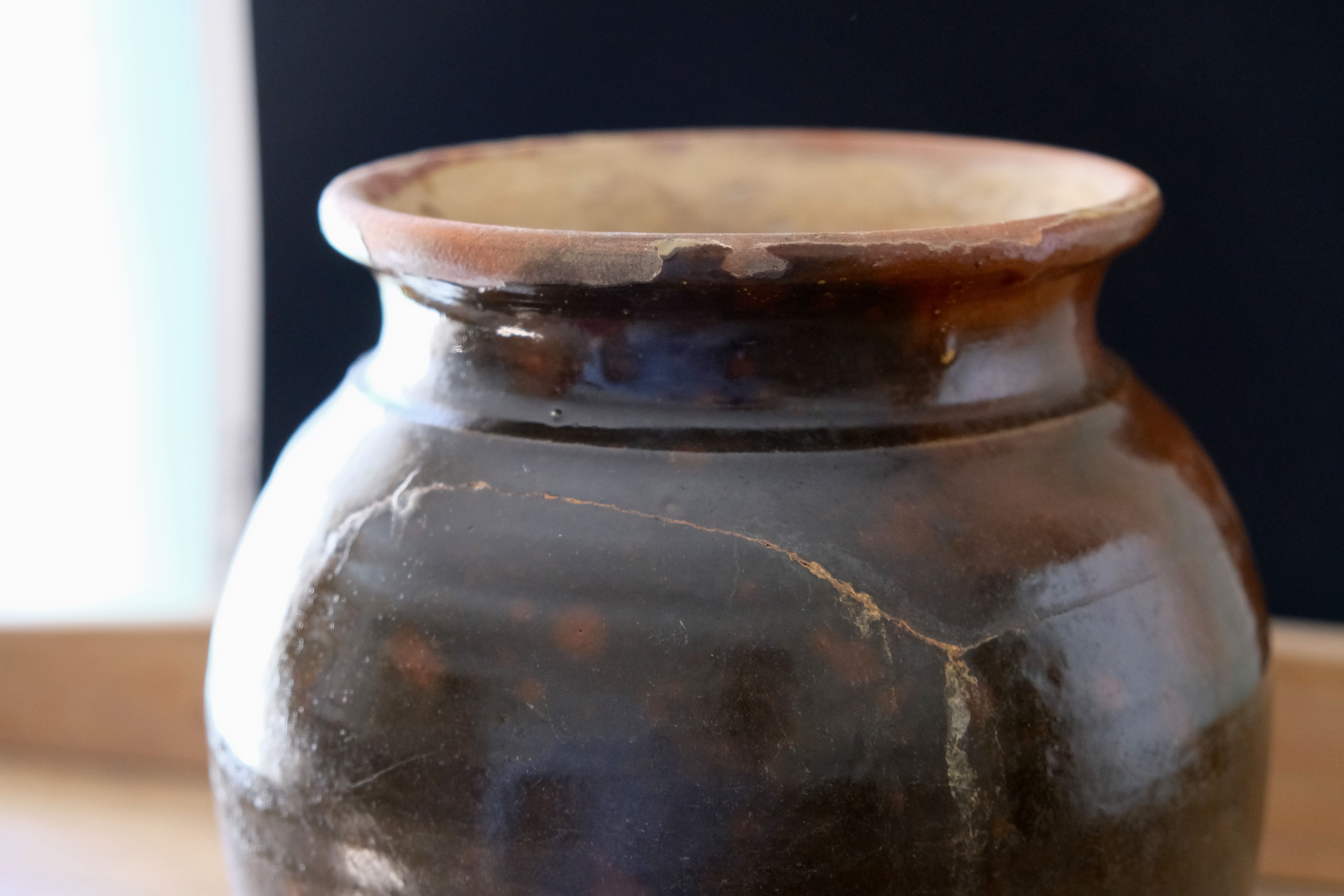 Old glazed terracotta pot
