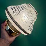 Vintage Art Deco globe wall/ceiling light in white, black, and gold glass.