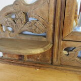 Old carved wooden pediment mirror