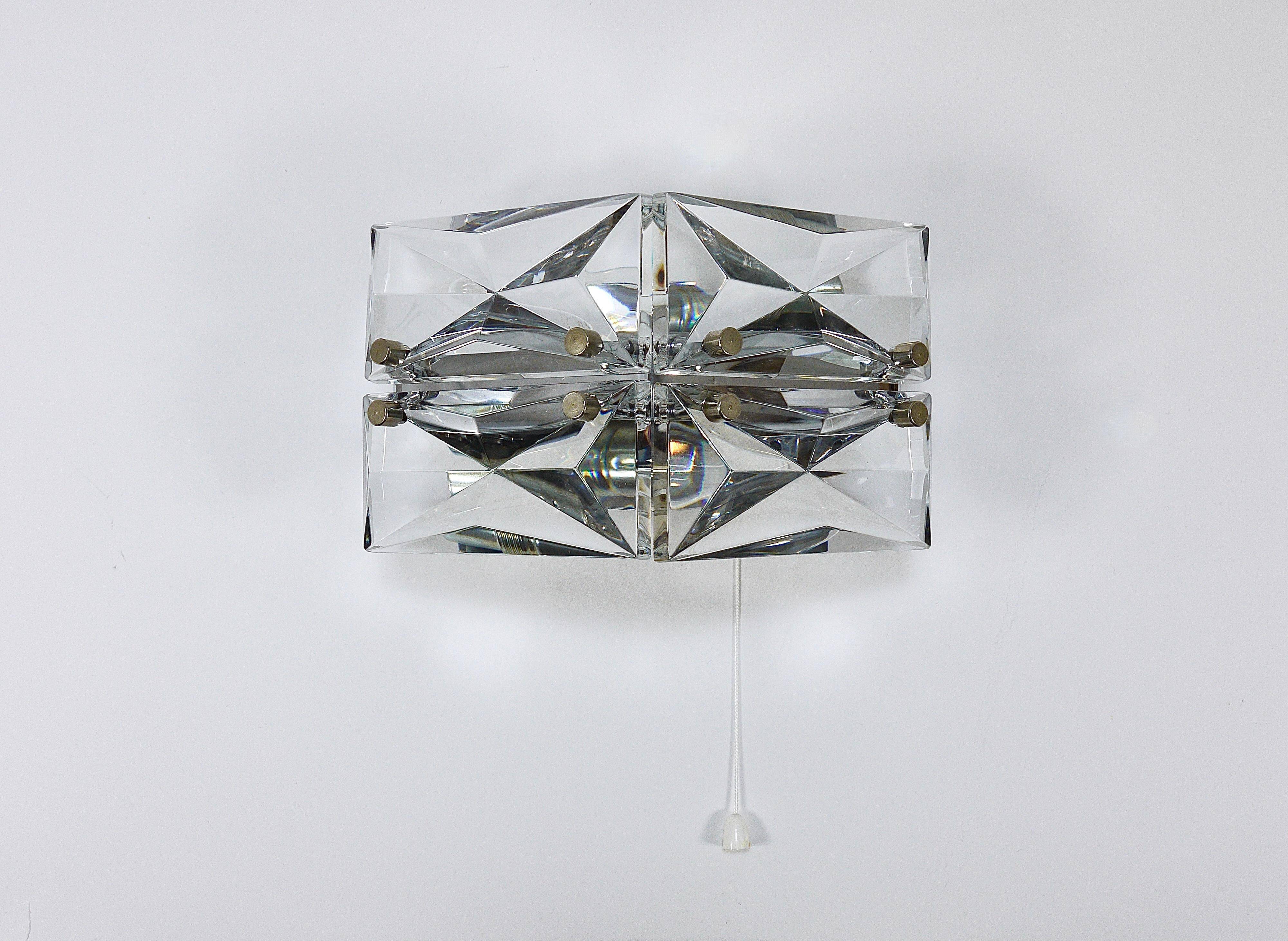 Pair of wall sconces in faceted crystal and chrome / prism glass wall lamps by Kinkeldey