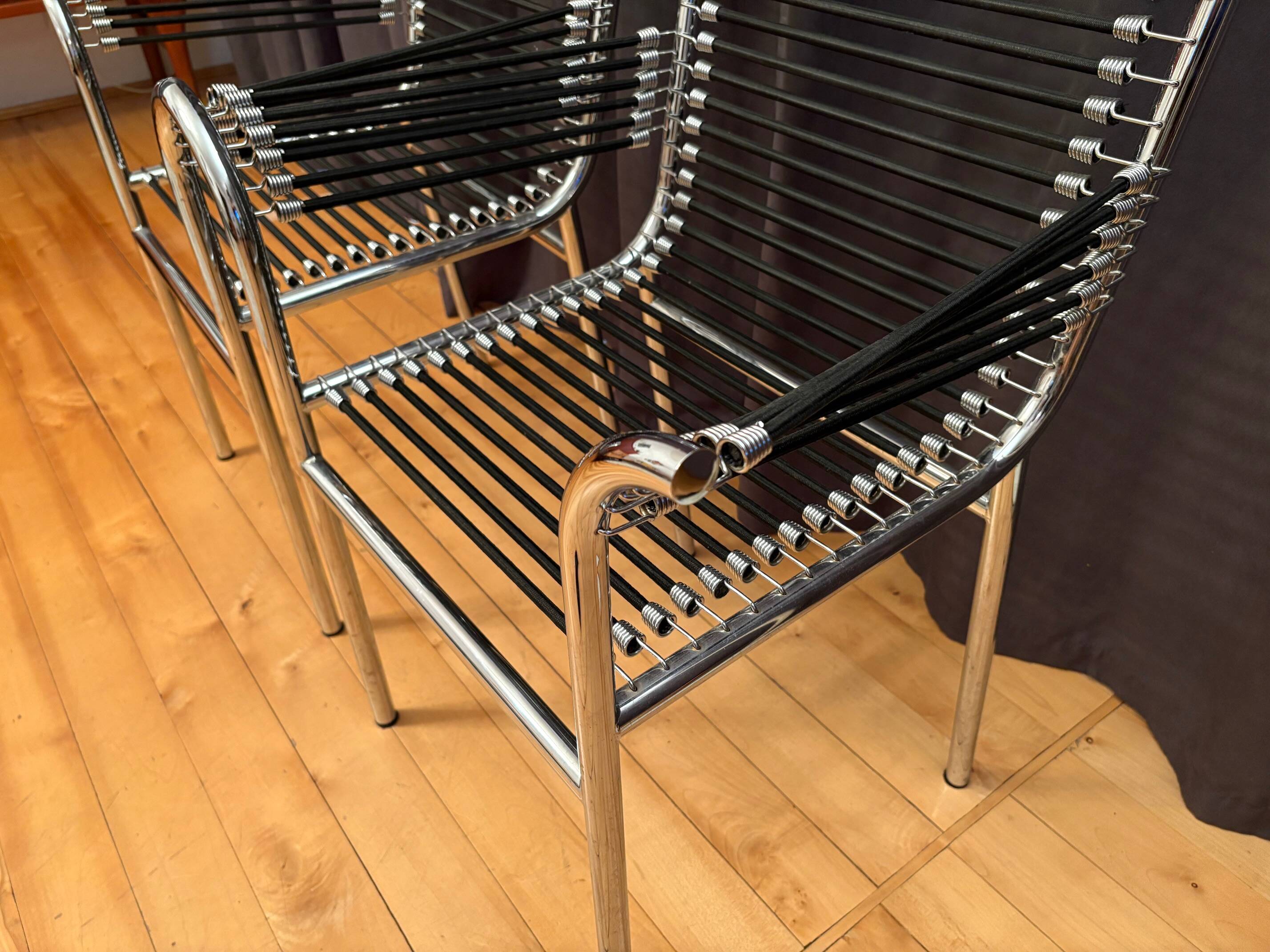 Pair of "Sandows" chairs designed by Rene Herbst, Bauhaus, France, 1980s