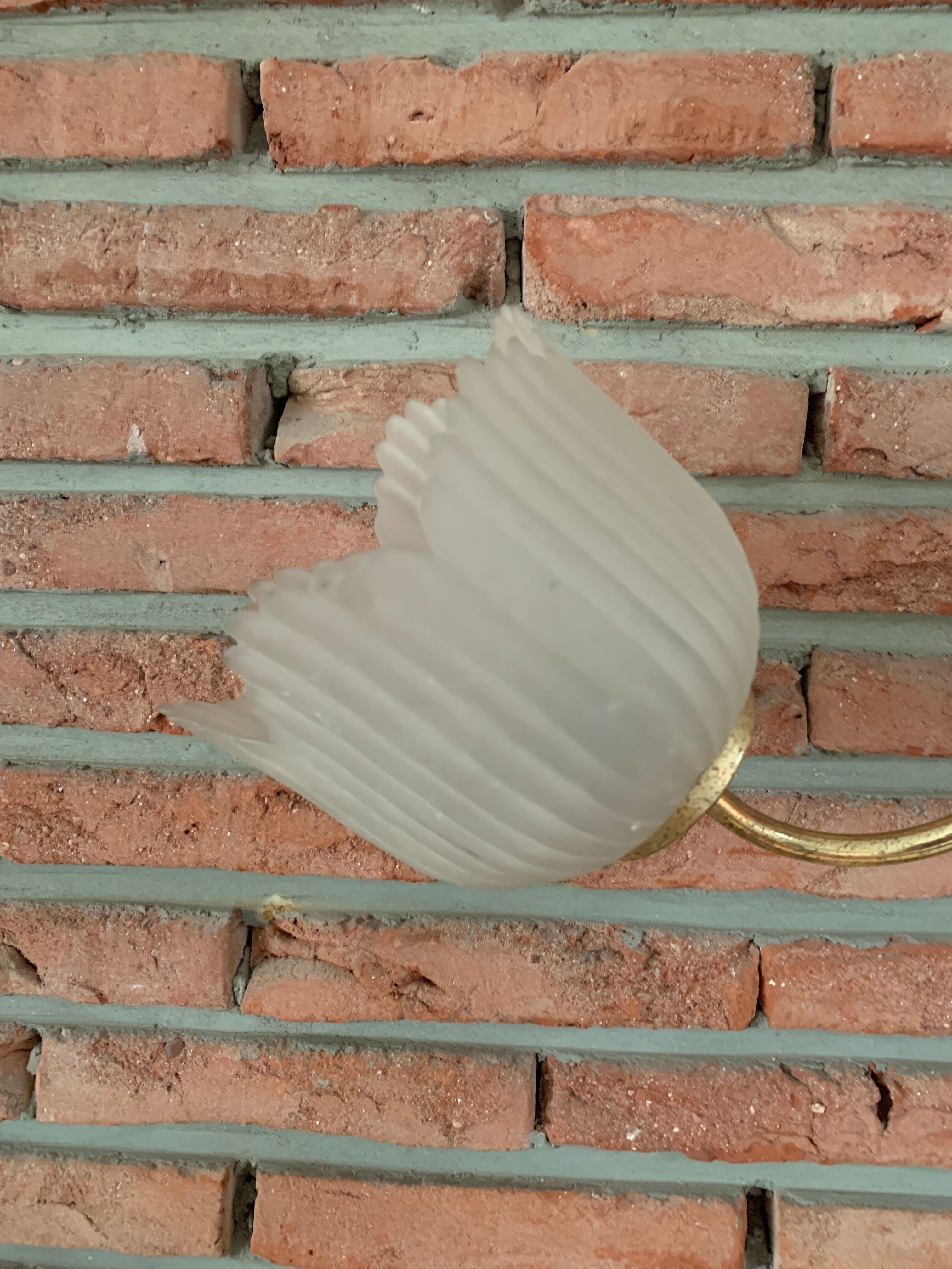 Brass and glass sconce