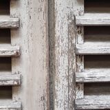Pair of antique oak slatted shutters measuring 273 cm
