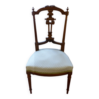 Upholstered chair in wood sulpte molding