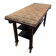 Industrial style creator table in bricks and metal on wheels.