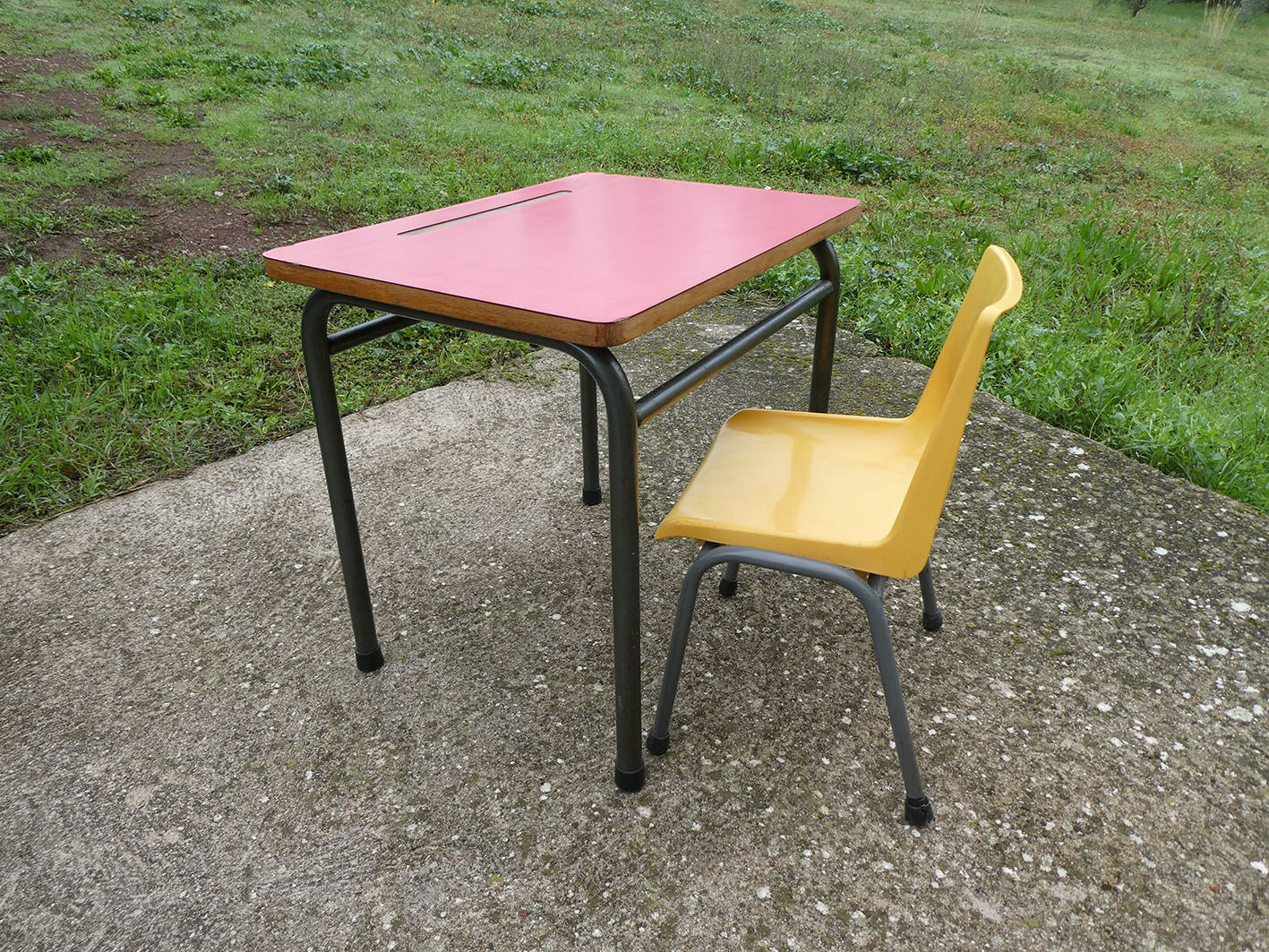 Child desk and vintage schoolboy chair