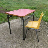 Child desk and vintage schoolboy chair
