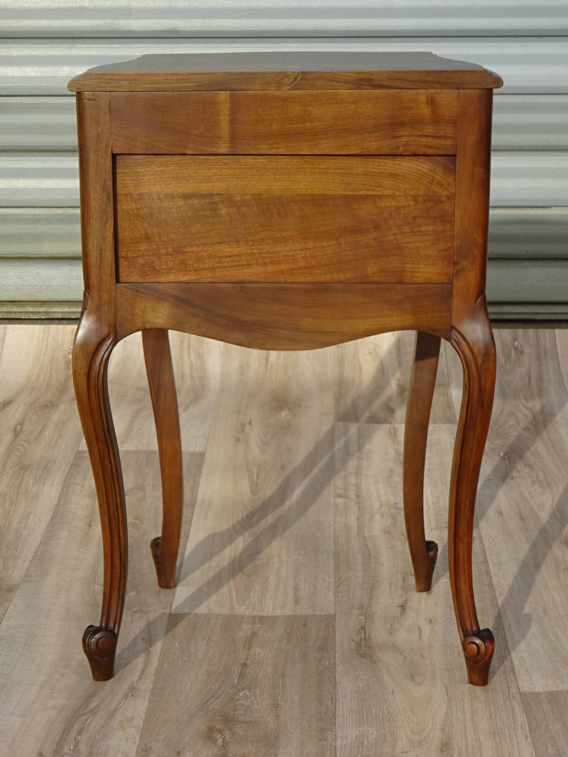 Small walnut bedside table in Louis XV style.